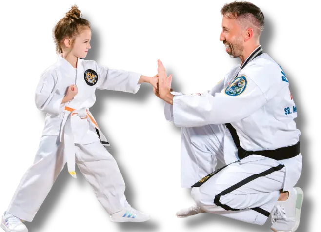 Martial arts student practicing striking on instructor
