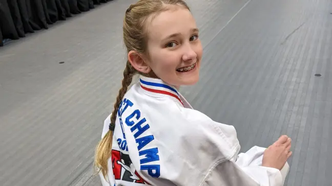 Martial arts student posing