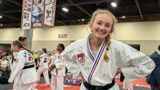 Martial arts student posing during a martial arts event