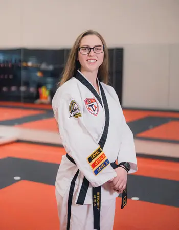 Ms. Emma Ball in martial arts uniform