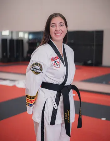Ms. Natalie Anderson in martial arts uniform